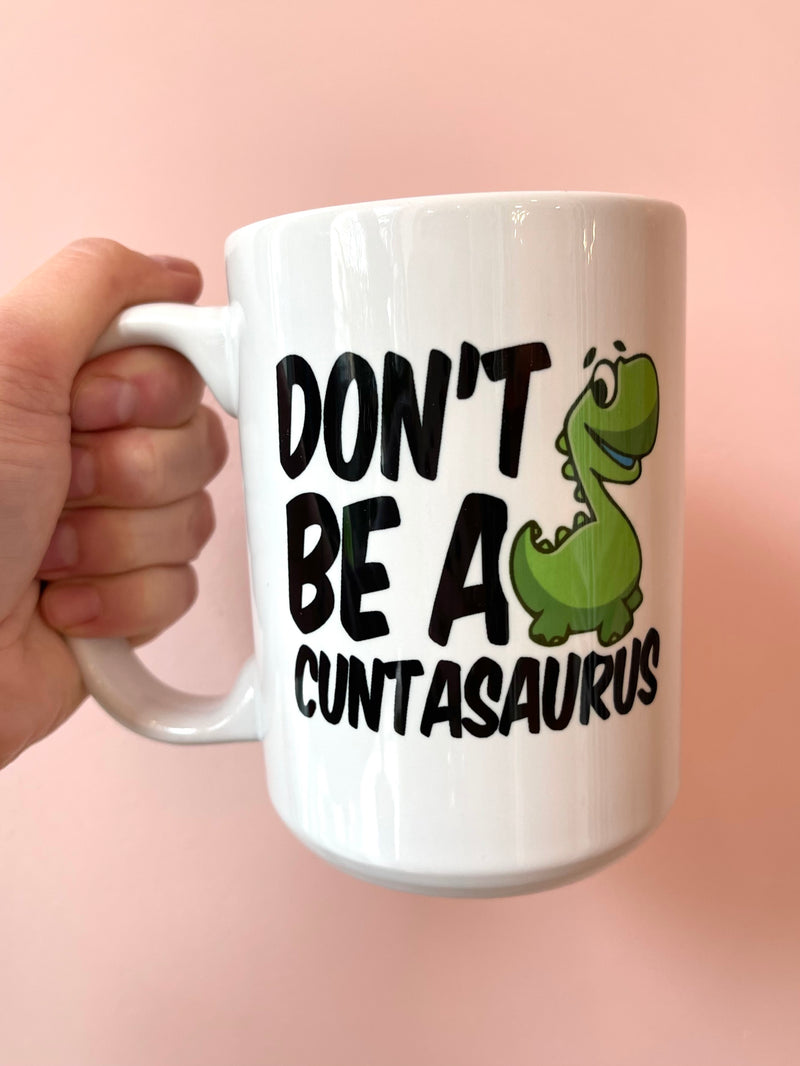 Don't Be A Cuntasaurus Mug
