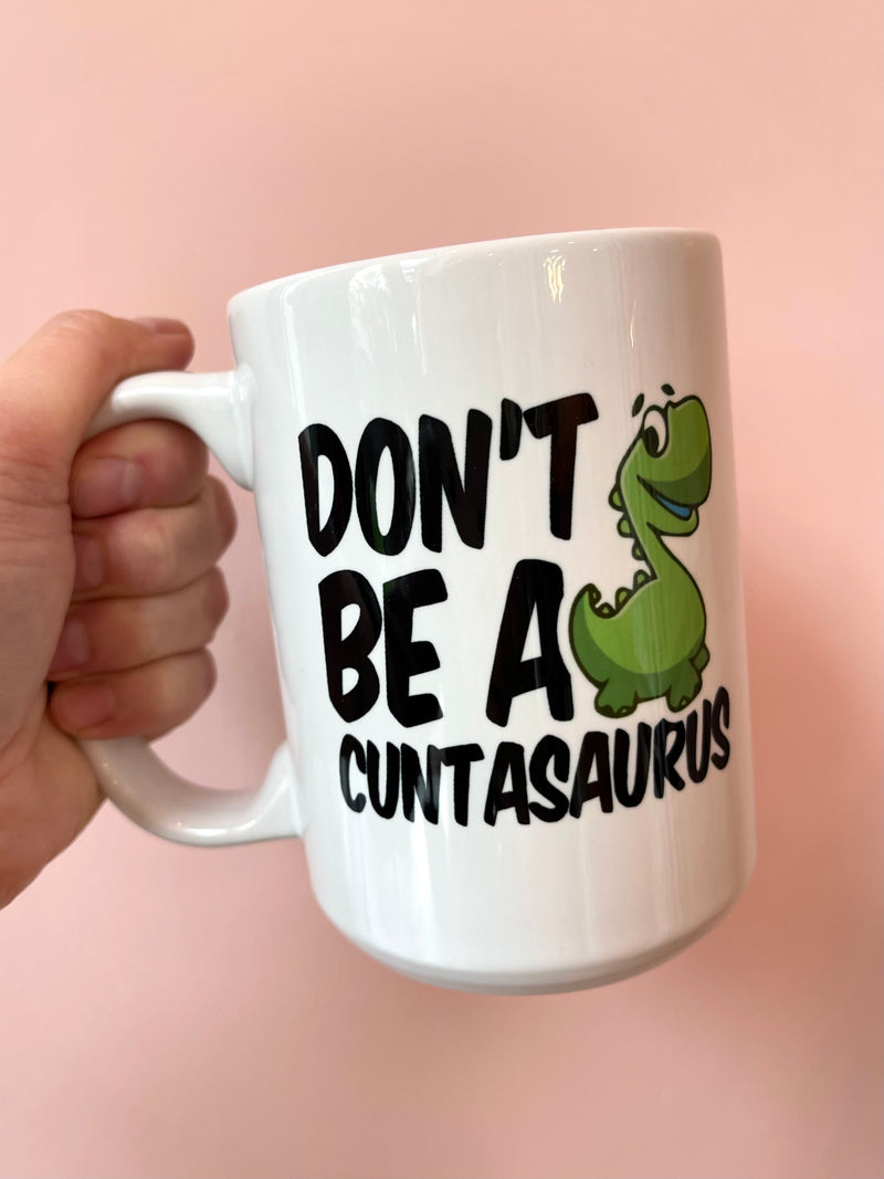 Don't Be A Cuntasaurus Mug